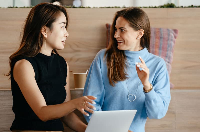 2 women talking