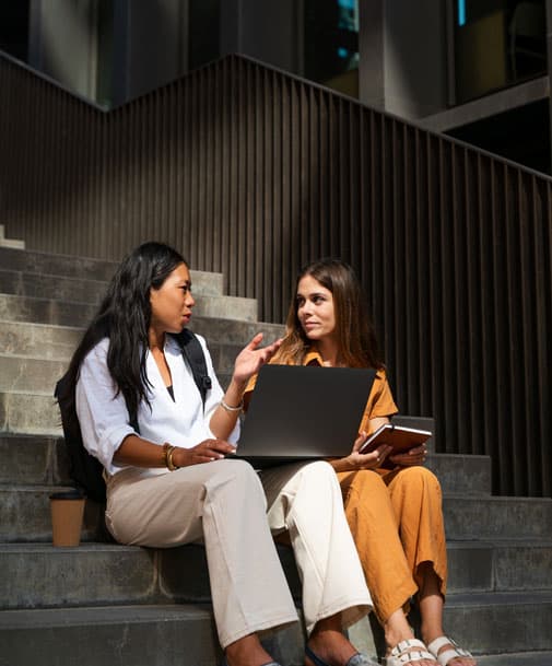 2 women talking outside